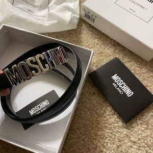 Size 42 black extra hole added moschino belt with duster , box and tags
